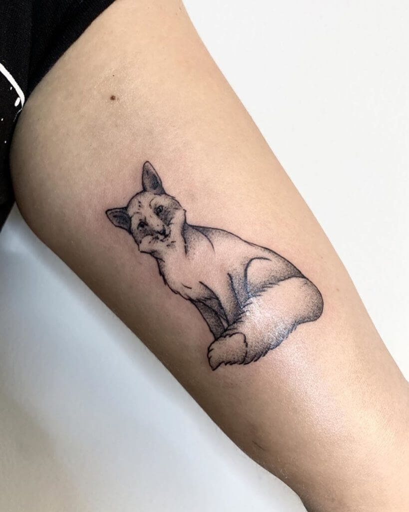 Women black dotwork tattoo of a fox on the left forearm