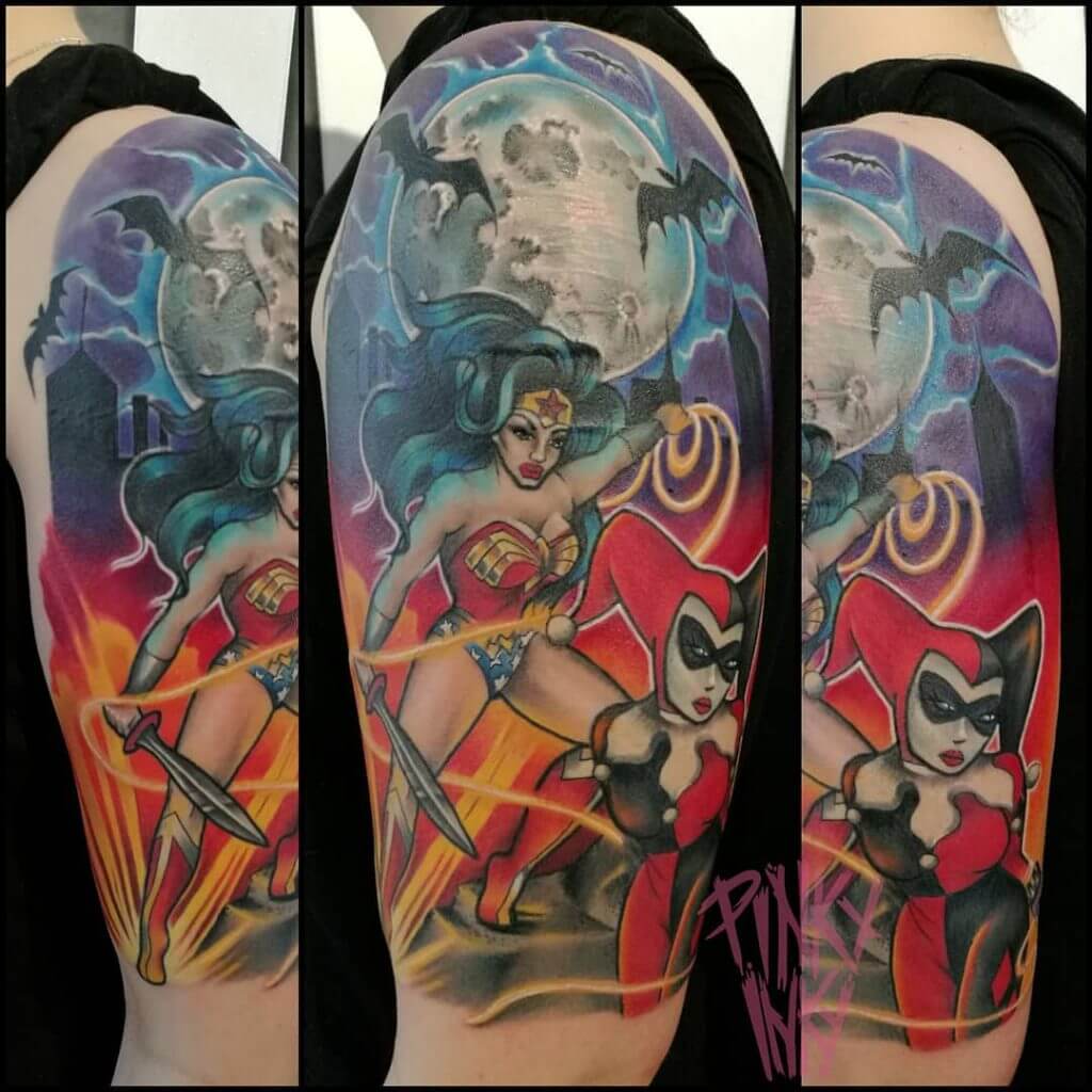 Color cartoon tattoo for men of Wonder woman and Harley Quinn on the left arm
