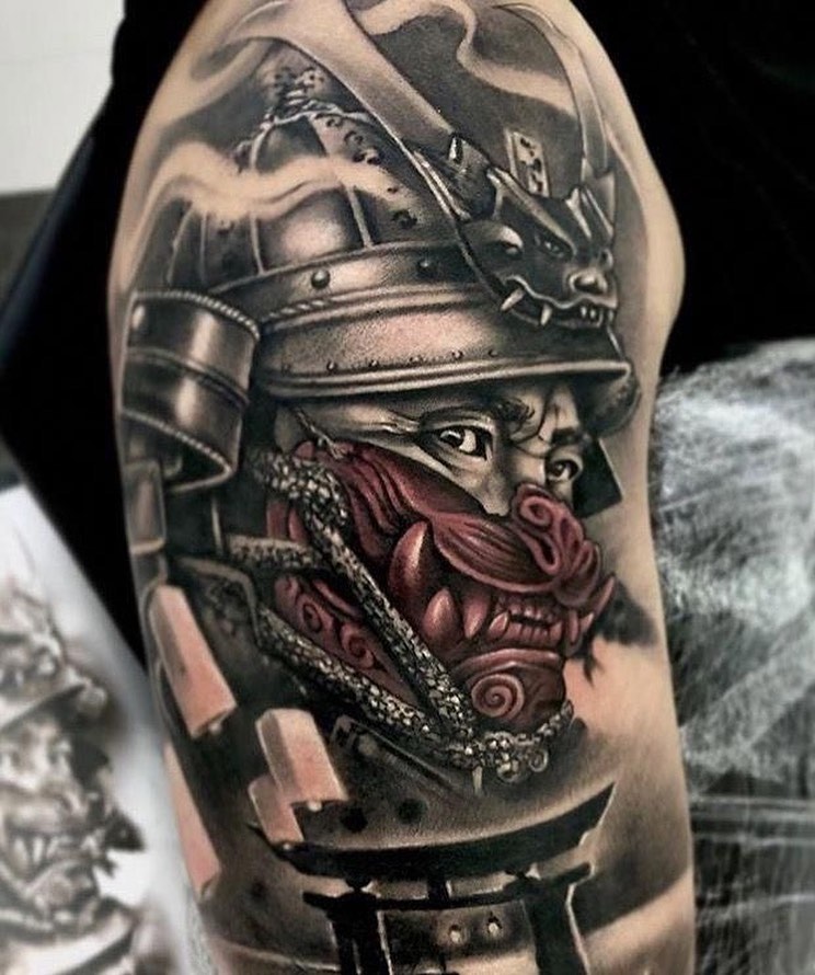 Black samurai tattoo on the right arm