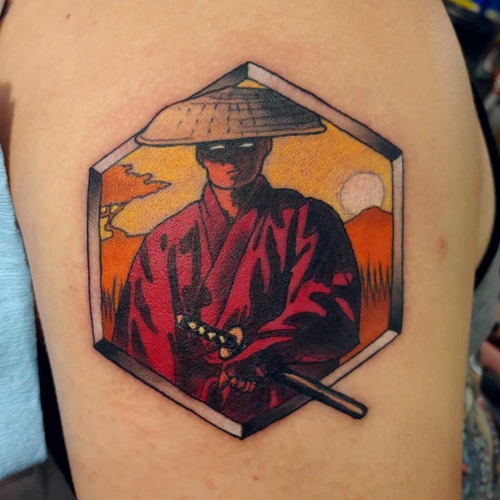 Color samurai tattoo on the right arm