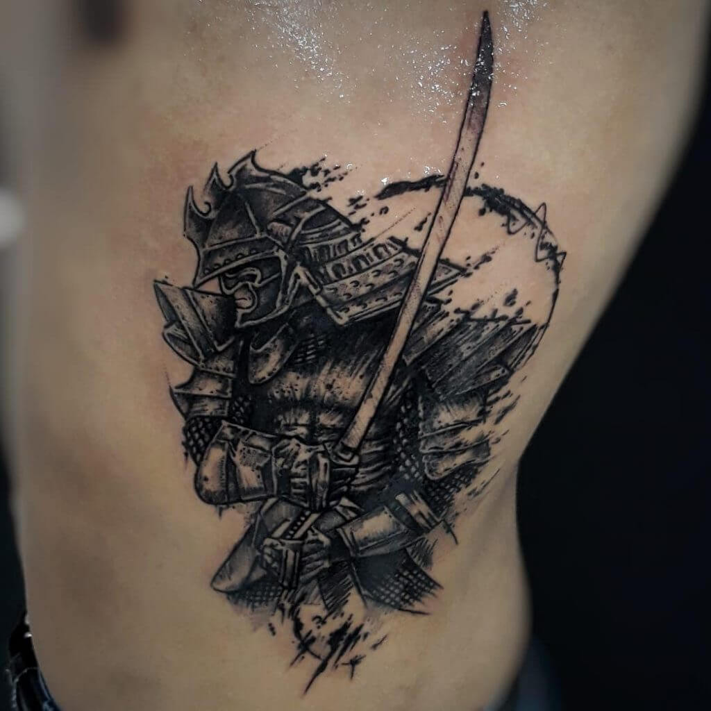 Black samurai tattoo on the ribs