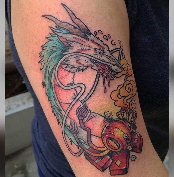 Color dragon tattoo for man on the right arm