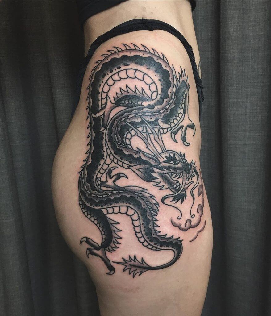 Black dragon tattoo for woman on the right side of the body