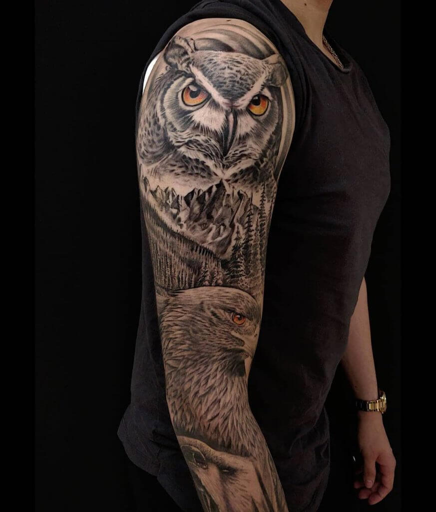 Black owl tattoo with eagle for men on the right arm