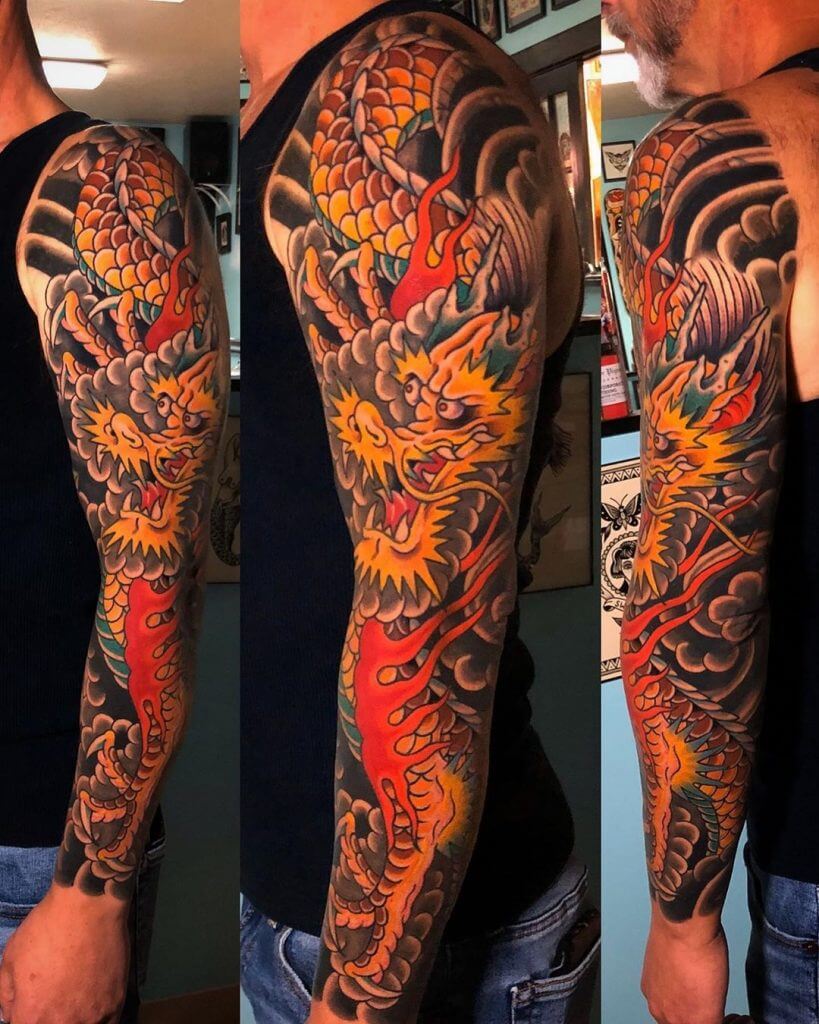 Color dragon tattoo for man on the left arm
