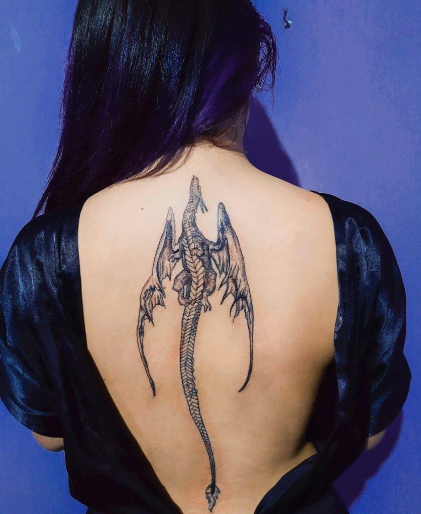 Black dragon tattoo for woman on back