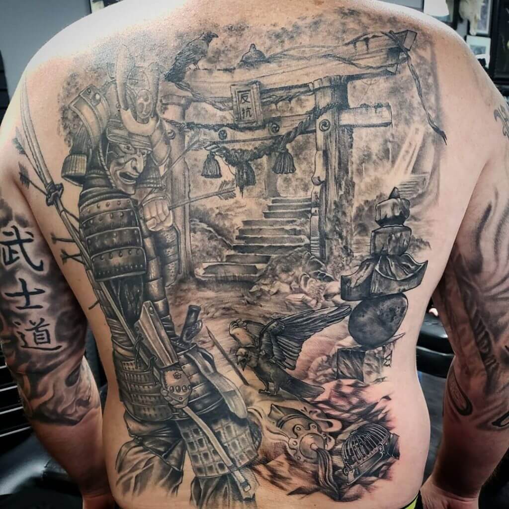 Black and gray back samurai tattoo