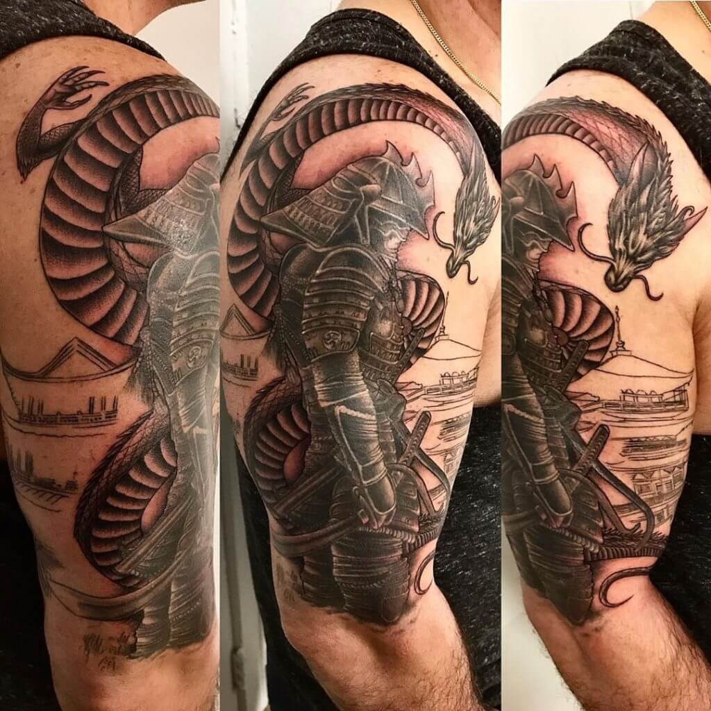 Black and gray arm samurai tattoo