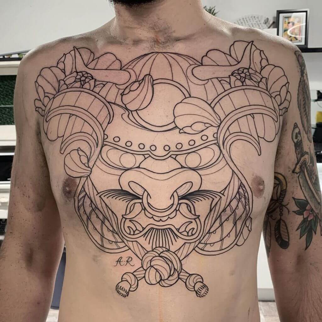 Samurai mask tattoo on the chest