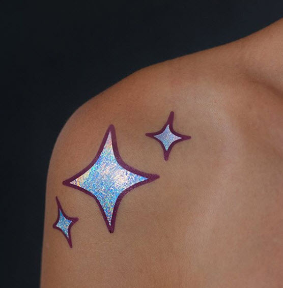 Temporary tattoo of stars on the shoulder