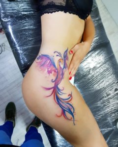 Tattoos that are a little bit bigger but beautiful on a womans body 5