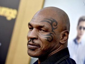 Mike Tyson is known for his face large tribal tattoo