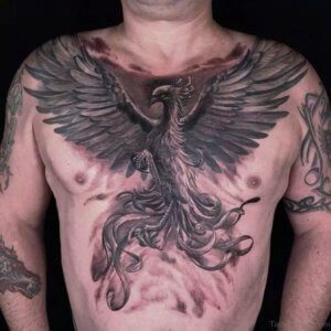 If you are tattoo lover you have to see those chest phoenix tattoos 5