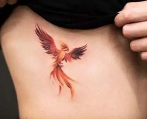 Impressive small phoenix tattoos 1