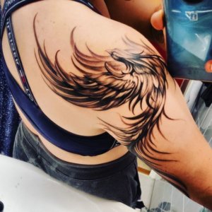 Placing a phoenix tattoo on your shoulder can be extremely magical idea 5