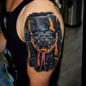 Supercharge your arm with some of these arm snake tattoos 5