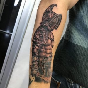 Top 15 forearm gladiator tattoo ideas for men 15