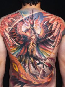 Use your back to get really memorable phoenix tattoo 3