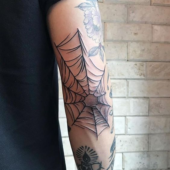 10 Memorable spider net tattoos on elbow