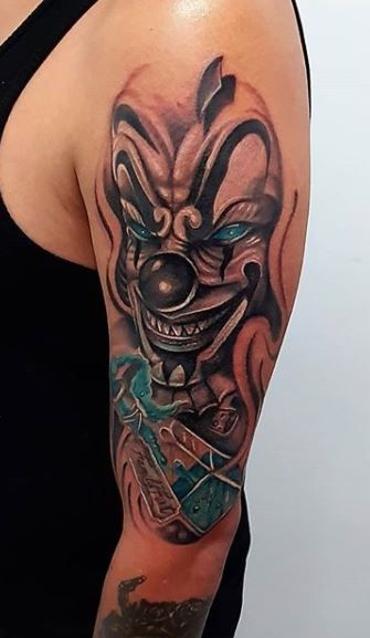 20 arm clown tattoo examples you can use as inspiration