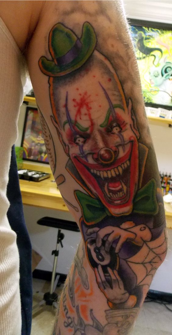 20 arm clown tattoo examples you can use as inspiration