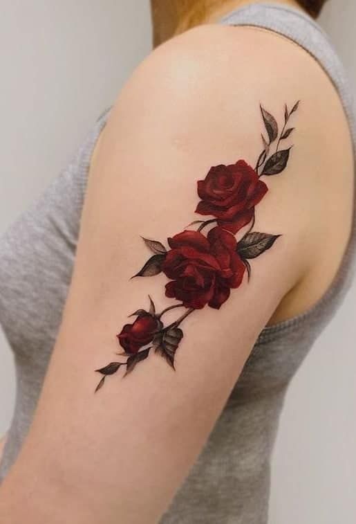 Cover your arm with a beautiful rose tattoo