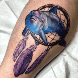 Daily inspiration with 20 cute dolphin tattoo designs 17
