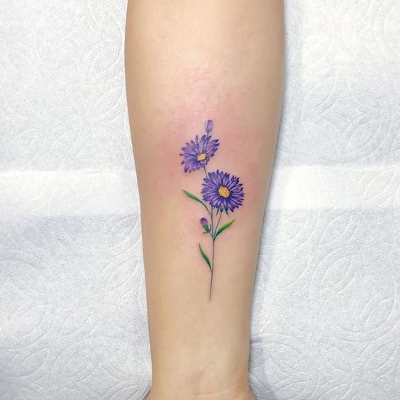 Did you know small aster tattoos can be so breathtaking