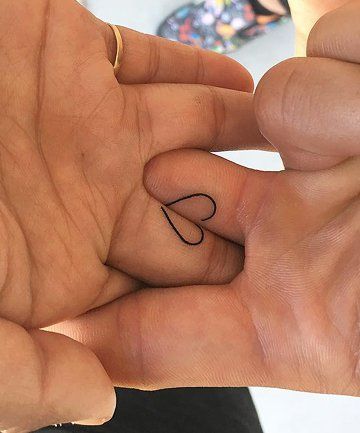 Express your love with heart fingers tattoo