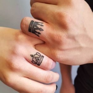 Having crown as a tattoo on your fingers can be exceptional idea 2