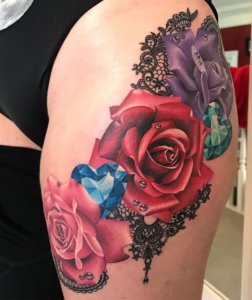 If you want big rose tattoo thigh is greate place for it 2