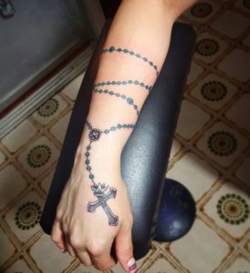 No mistake for sure with rosary forearm tattoo 4