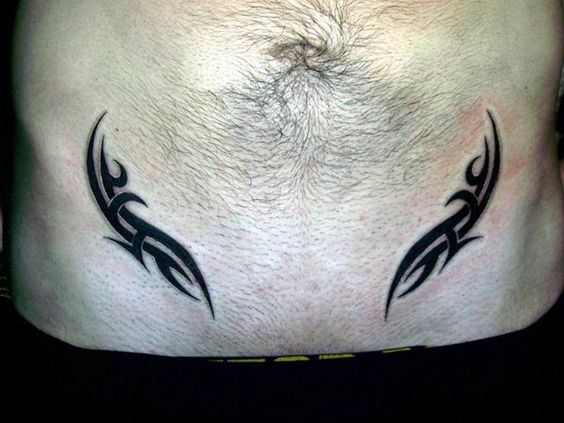 Tribal womb tattoos can look stunning on your belly