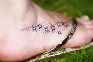 Walk on with the stars with foot stars tattoo 5