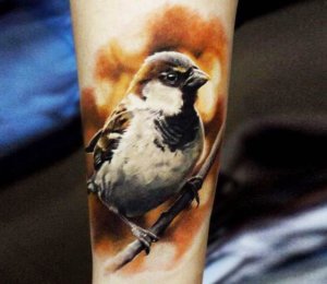 Why not check these 10 adorable realistic sparrow tattoo ideas 2