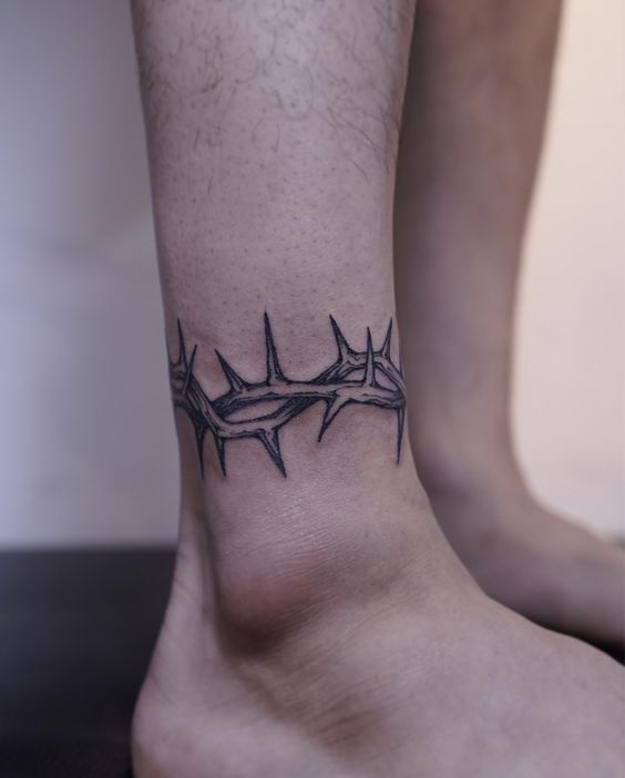 10 Mind-blowing crown of thorns tattoos