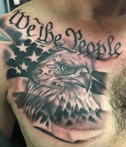 chest We the People tattoo with flag and eagle