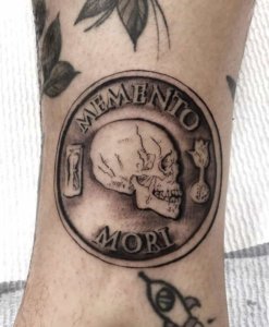 15 exceptional memento mori skull tattoos 12