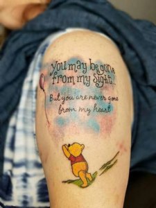 Be unique by getting Winnie the Pooh tattoo with a quote 4