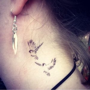 Check our suggestions for small sparrow tattoos suitable for men and women 3
