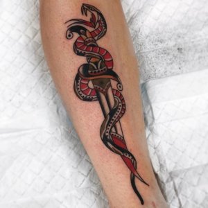 Dagger with snake is really astonishing tattoo 1