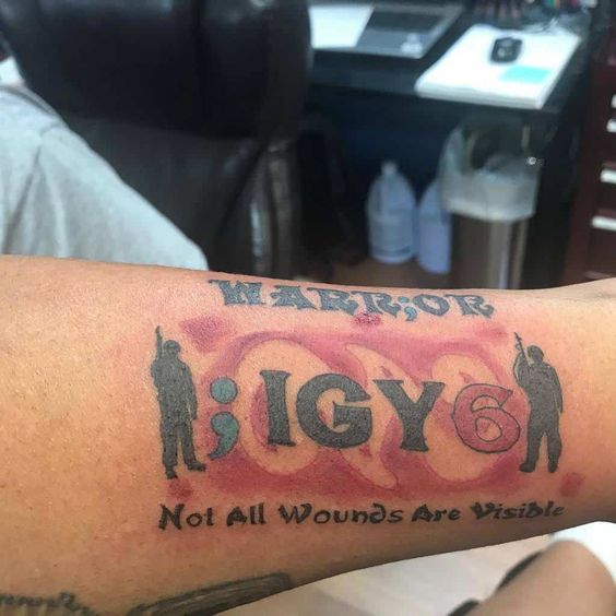 Impressive military style igy6 tattoo