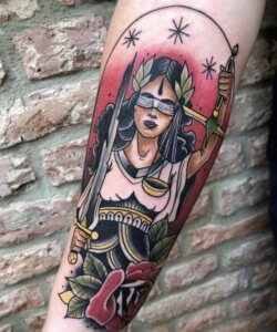 Keep to traditions and be gorgeous with traditional Lady Justice tattoo 3