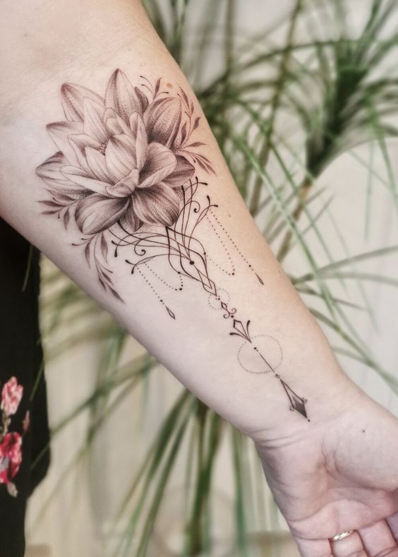 Lotus forearm tattoo is not scary but makes you tempting for sure