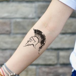 Magic and the beauty of small spartan helmet tattoo 1