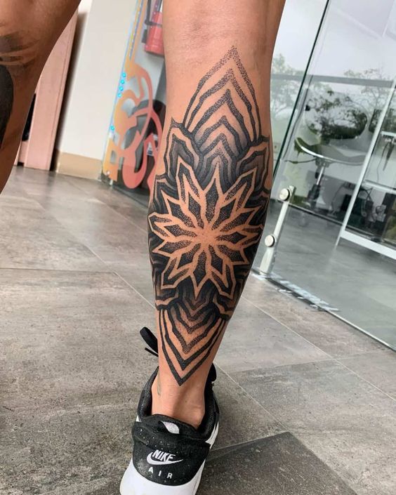 Our selection of 10 fascinating calf tattoos for men
