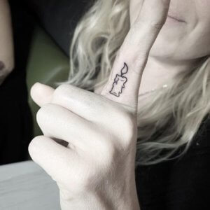 Small candle tattoos are popular these days 3