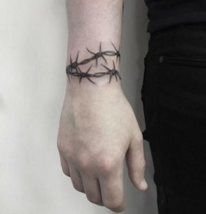 Why are wrist barbwire tattoos so badass See it in these examples 5