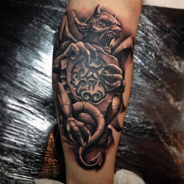 Why gargoyle tattoo on calf can look so scary