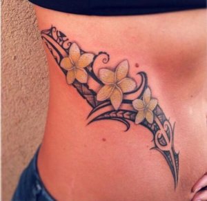 Why not check some of these tempting ideas of tribal plumeria tattoos 7